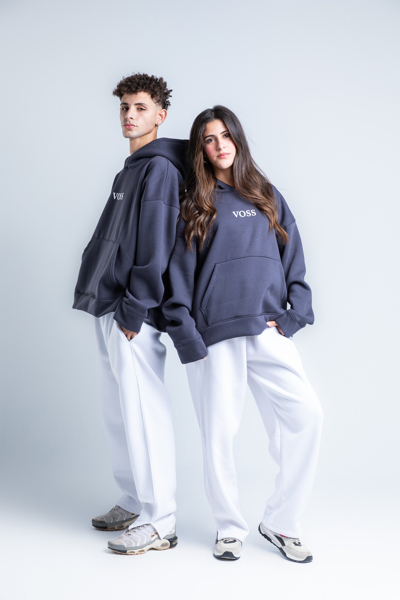 White wide-legged sweatpants styled with a casual top, perfect for lounging or running errands in comfort and style.