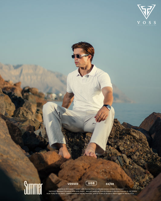 Polo shirt styled with casual pants for a refined, yet relaxed outfit suitable for various occasions.