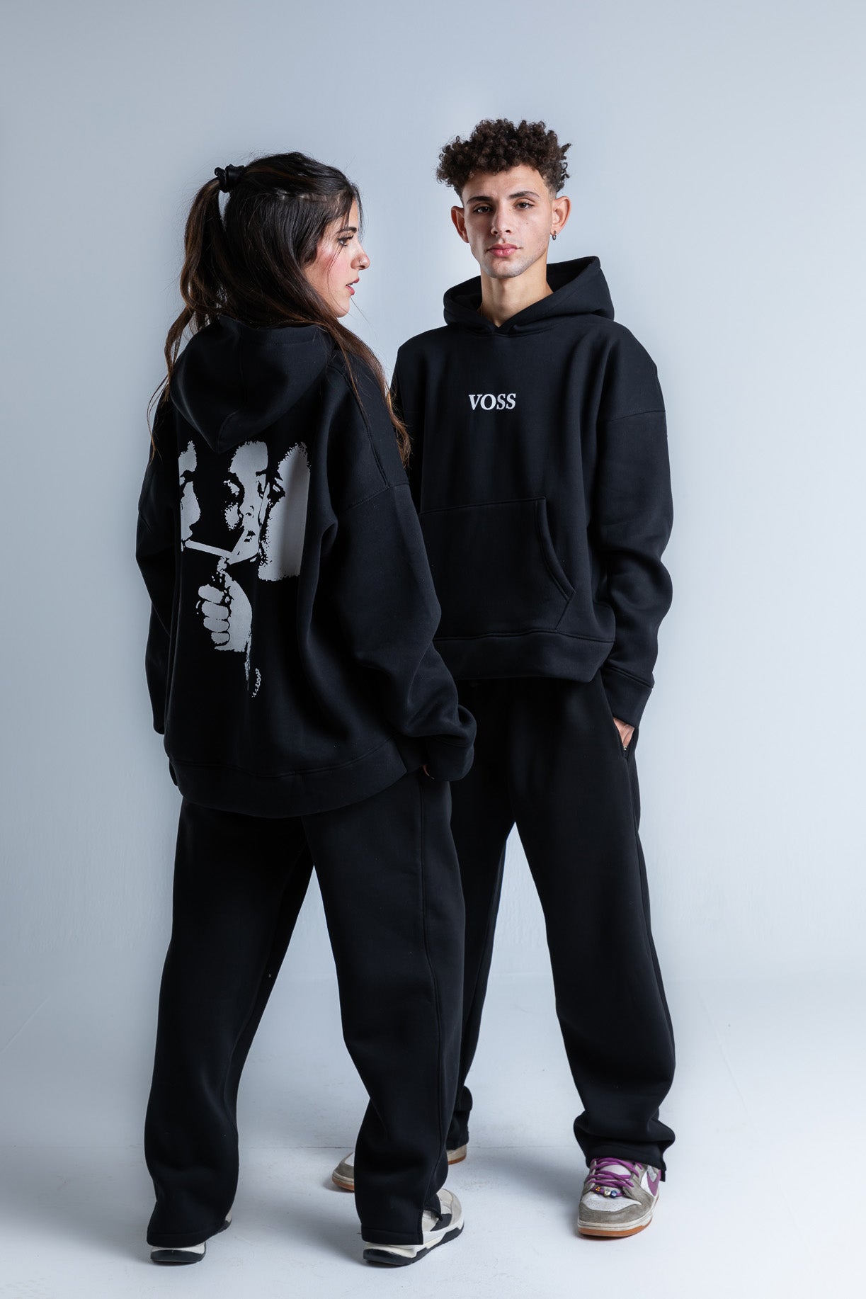 Puff Pass hoodie paired with casual bottoms, perfect for laid-back looks and everyday wear.